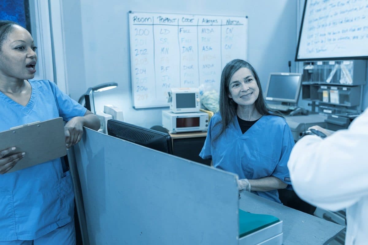 A care team coordinating at a nursing station